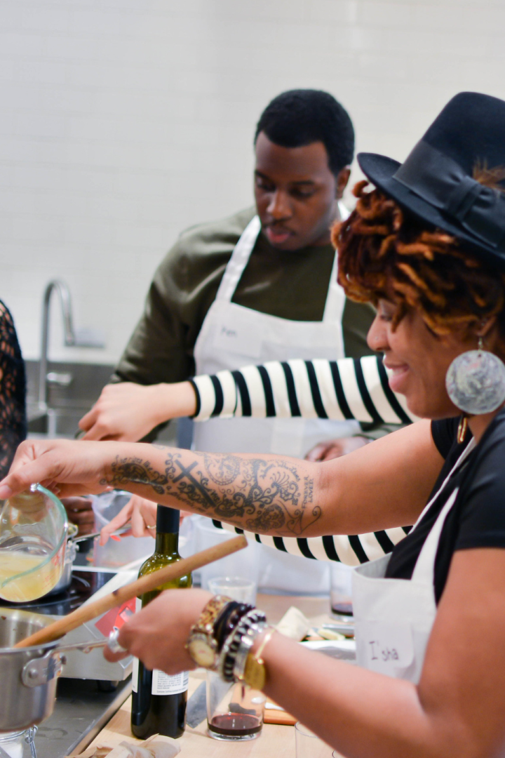 holiday cooking | mental health in the black community | mental health Atlanta, GA | therapy for black people in Atlanta | Atlanta therapist | 30213 | 30097 | 30126 Image of a black family cooking a holiday meal. Representing something that can cause stress to mental health in the black community in Atlanta. However you can be joyful like the people in the photo with guidance of an Atlanta therapist in therapy for black people.