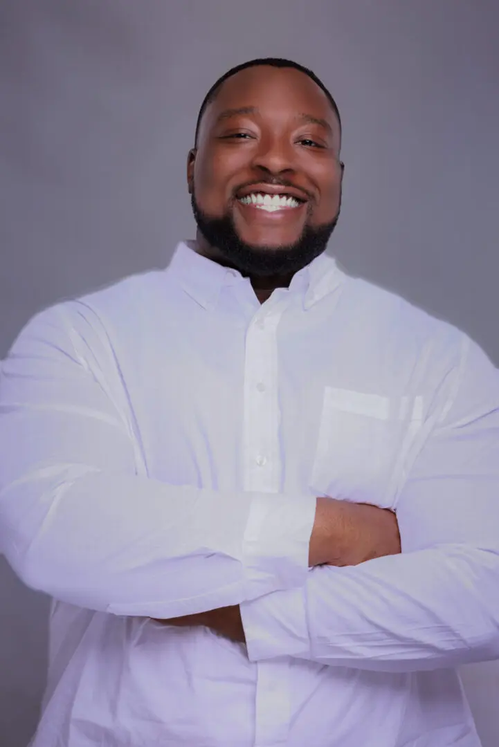 Atlanta Therapist Providing Anxiety and Depression Therapy for Black Women | 29821 | 29812 | 30327 | 30005 | 30075 A Black male therapist in Atlanta, smiling warmly, offers supportive anxiety and depression therapy for Black women.