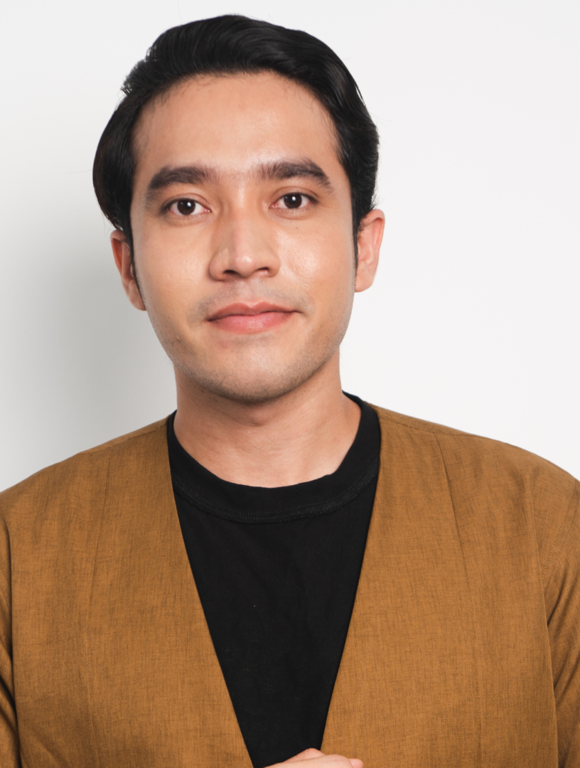 Therapy for Asian Men | Overcoming Internalized Racism in the BIPOC Community | 30080 | 30339 | 30067 | 30213 | 30097 Asian man looking forward wearing brown sweater in therapy addressing internalized racism and its emotional impact in a BIPOC community context