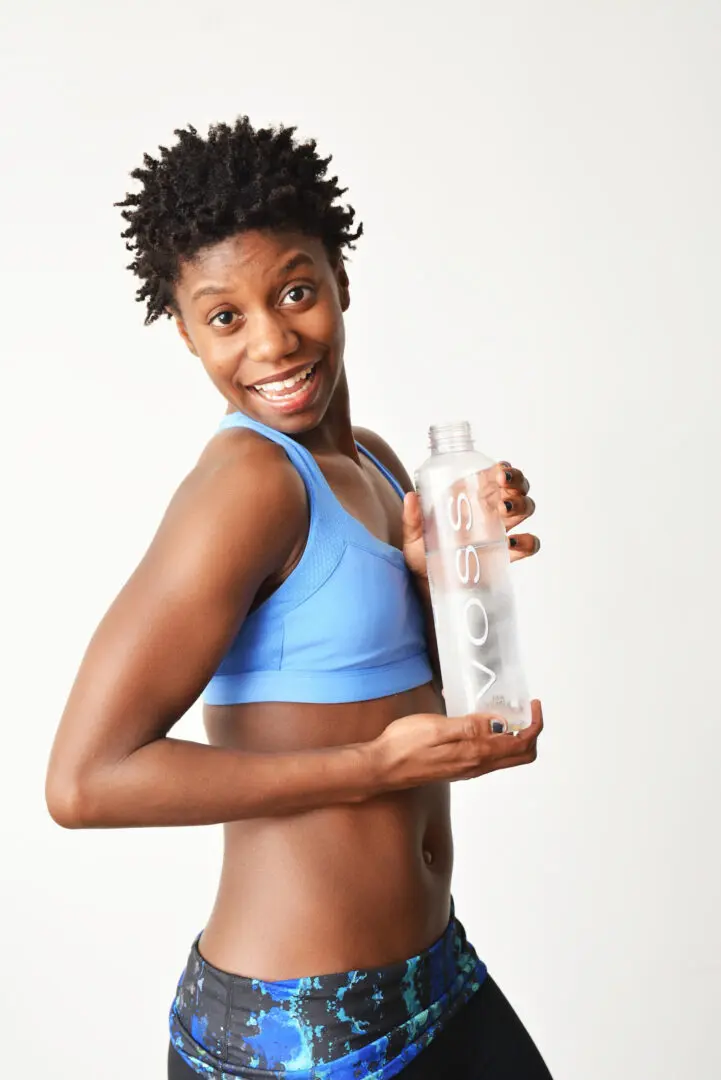 workout outfit | managing depression in Atlanta, GA | depression counseling in Atlanta | depression symptoms Atlanta | Atlanta depression therapist | 30213 | 30097 | 30126 Image of a Black Woman in a workout uniform. Showing one of the techniques for managing depression. It is one thing that might be suggested in depression counseling from an Atlanta depression therapist.