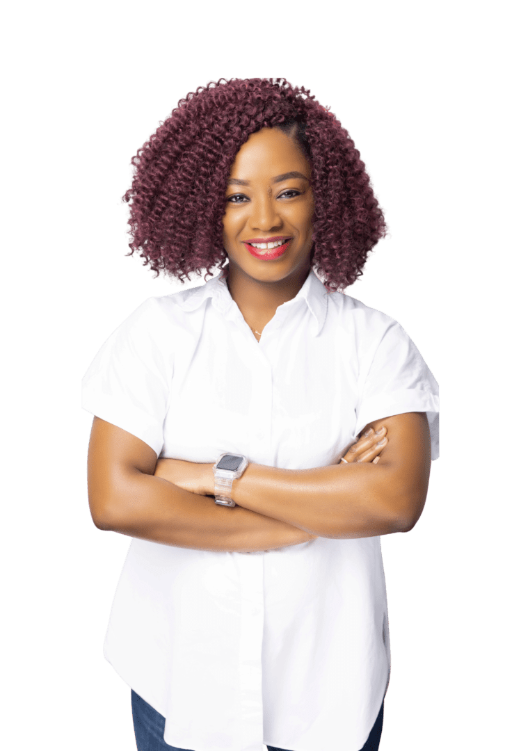 Image of friendly Black female mental health professional in Atlanta, Georgia, wearing white shirt, jeans, and red natural hair, providing compassionate therapy for anxiety