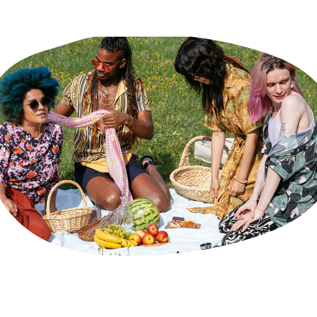 Image of a group of 4 people having a picnic in the park. Representing that anyone is welcome at LGBTQIA therapy in Atlanta, GA. With the right LGBTQ therapist near you in Atlanta, GA you can start getting LGBTQ counseling tailored your needs.