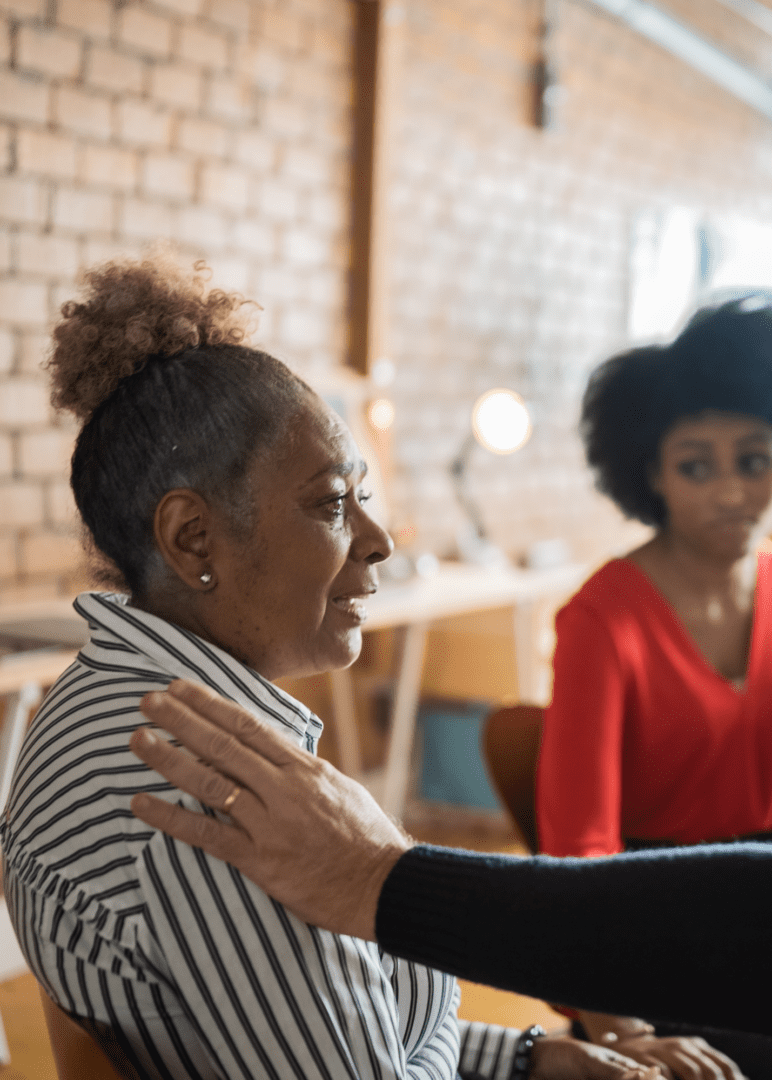 Image of a Black woman taking part in anxiety group therapy in Atlanta. Representing what it can look like to get support in group therapy with an Atlanta group therapist in Georgia.