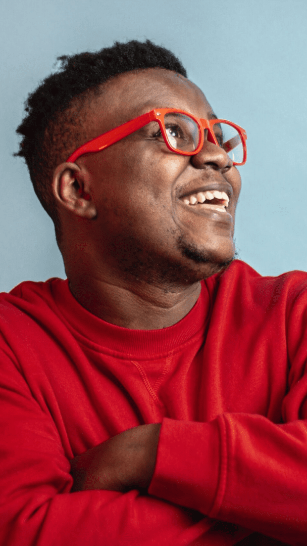 Image of a smiling black man. Representing the benefits that can come from meeting with a black therapist in Atlanta. Get support from a black male therapist in therapy for African American males in Atlanta, GA.