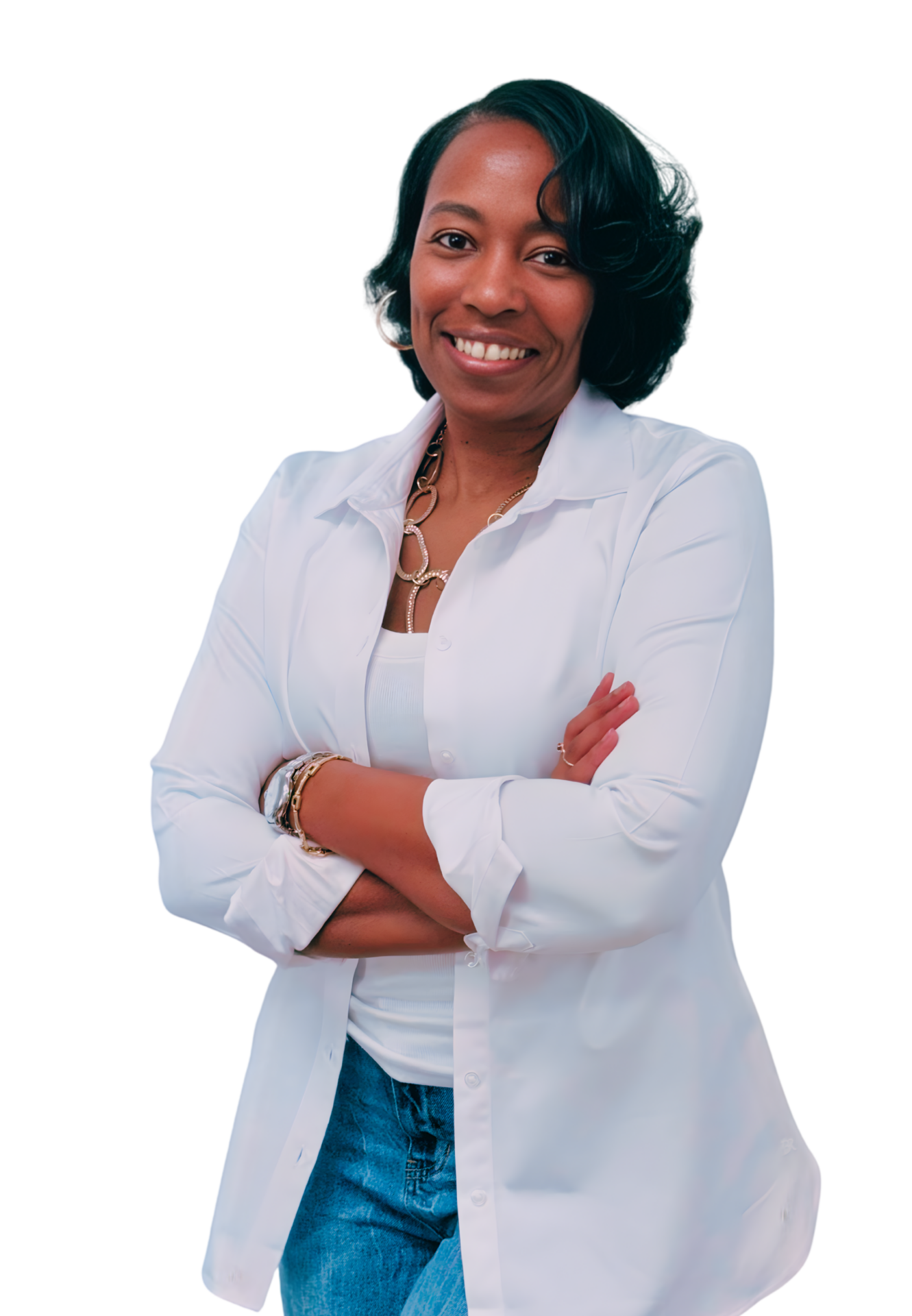 Smiling Black female therapist wearing a white button-down shirt and jeans, standing with arms crossed, representing grief therapy, women’s mental health counseling, and workplace stress therapy in Georgia (30080, 30339, 30067, 30213).